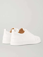 CHRISTIAN LOUBOUTIN
Louis Junior Spikes Cap-Toe Suede Sneakers