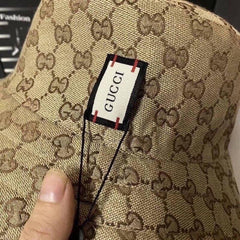 Gucci Reversible Hat in GG Canvas and Nylon Beige Bucket