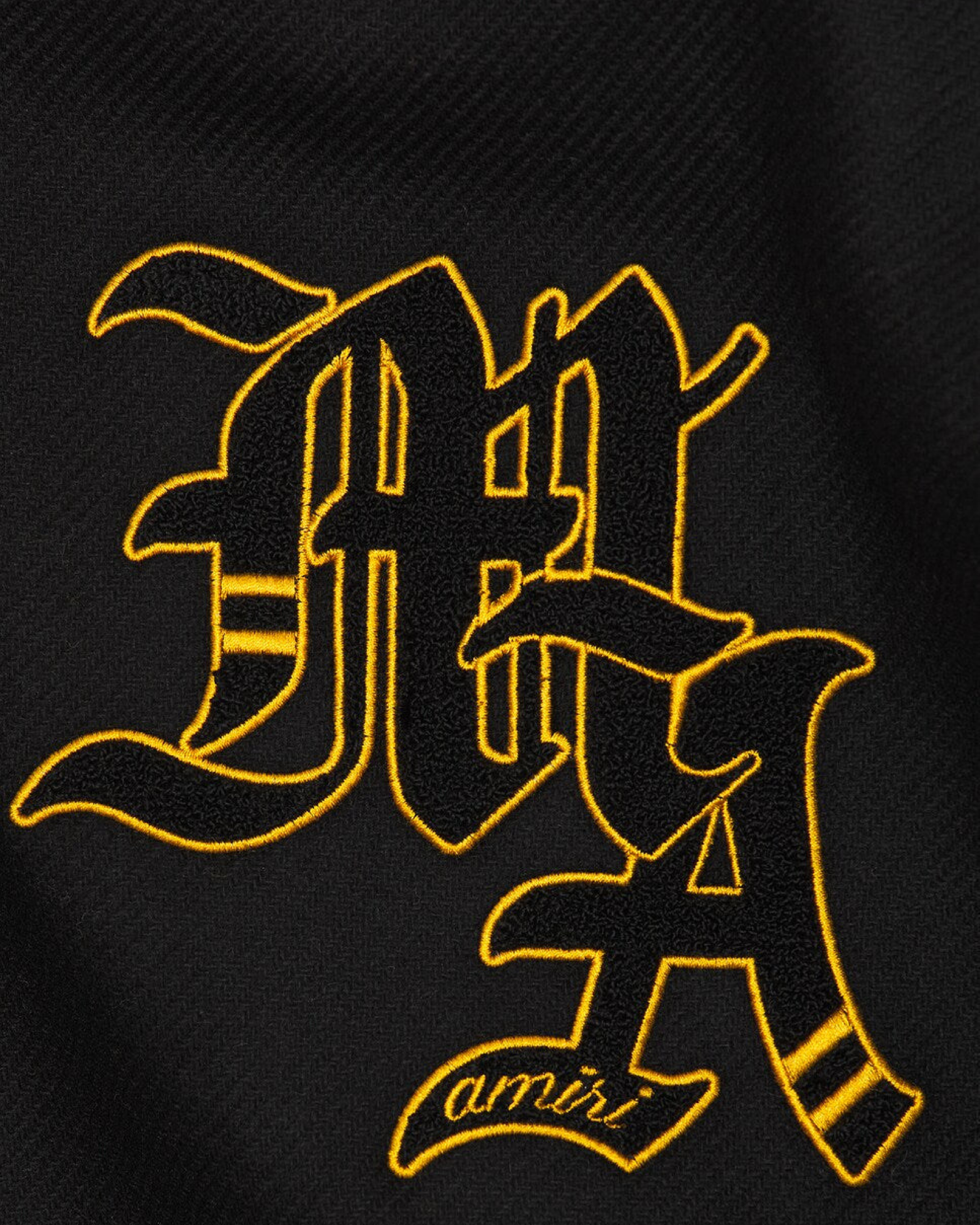 AMIRI
Lion Varsity Jacket - SpinServe